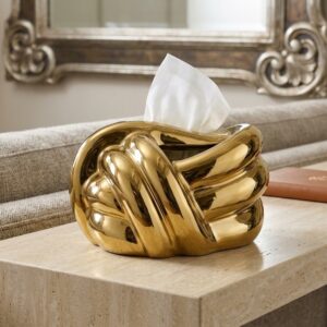 Crafted from solid ceramic with a high-gloss electroplated metallic gold finish.